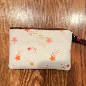 Coach Cream Wristlet with Orange and Pink Stars